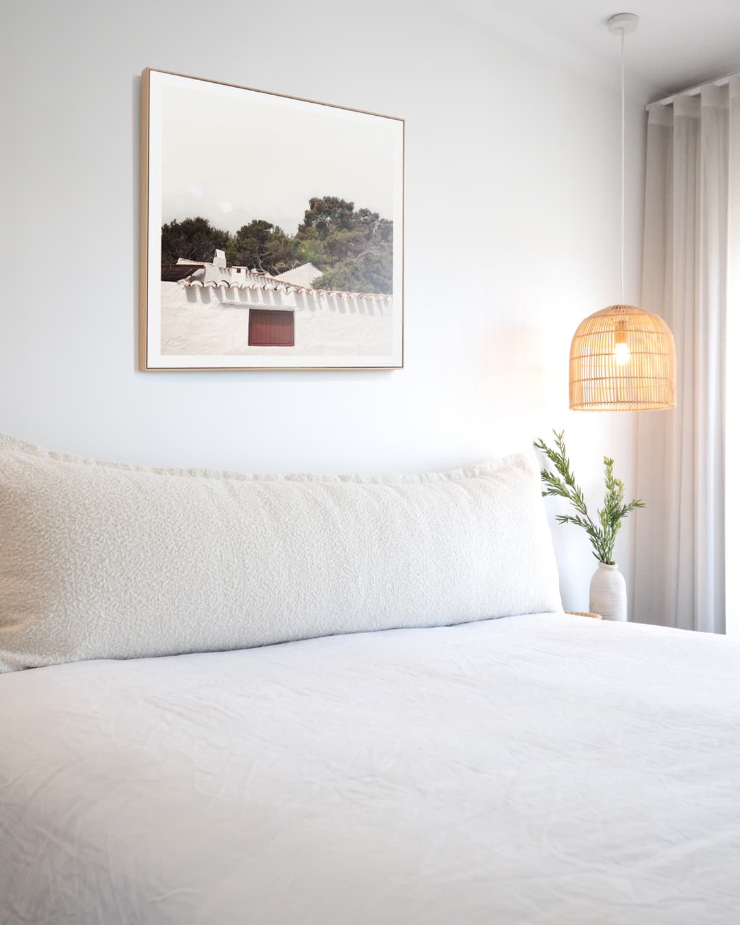 Ivory Boucle bedhead cushion.